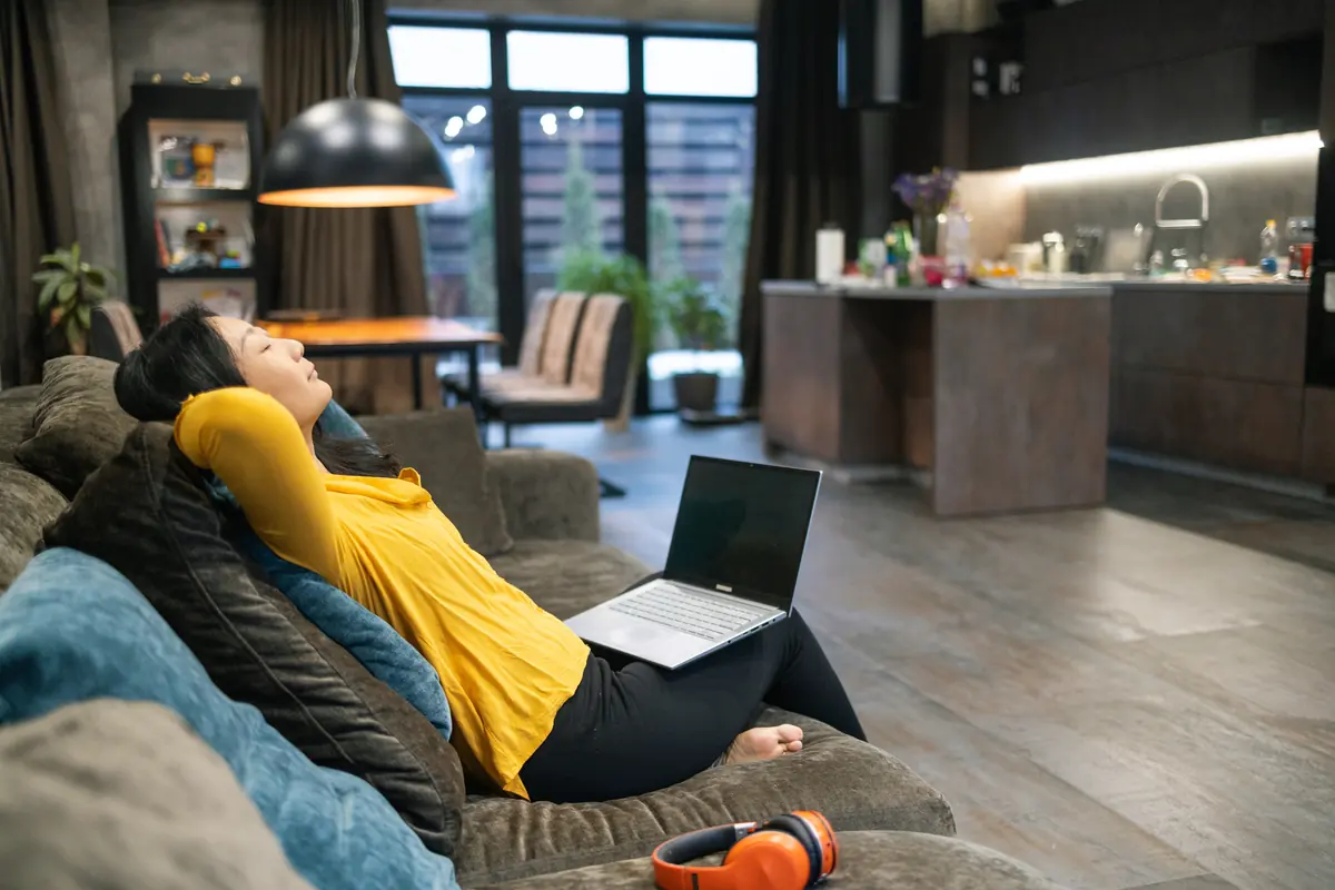 Person relaxing at home with low-income internet in Racine, Wisconsin