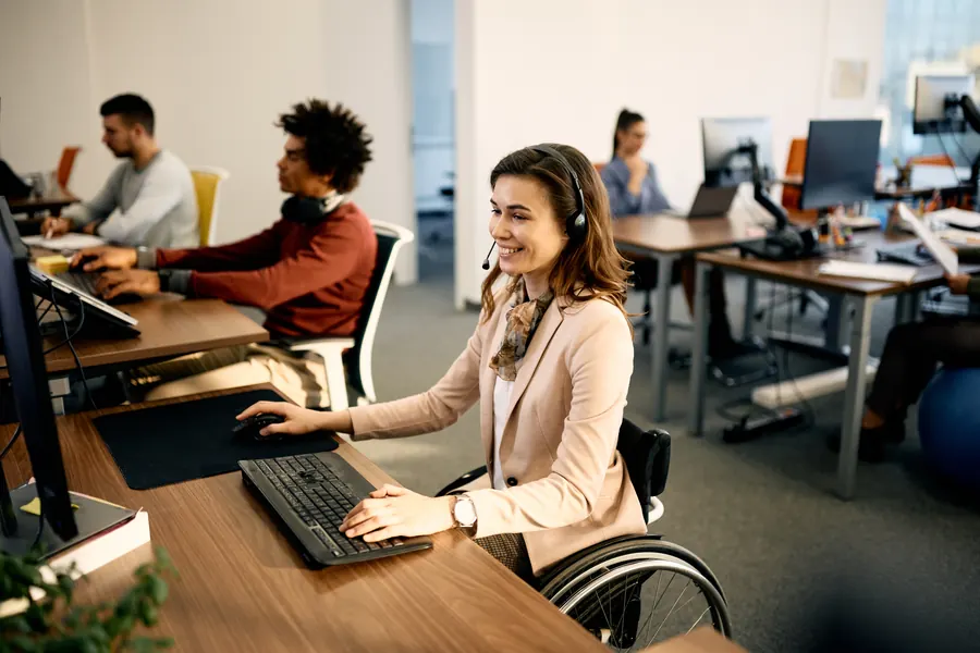 Woman working from home over a low-cost Optimum Advantage internet plan